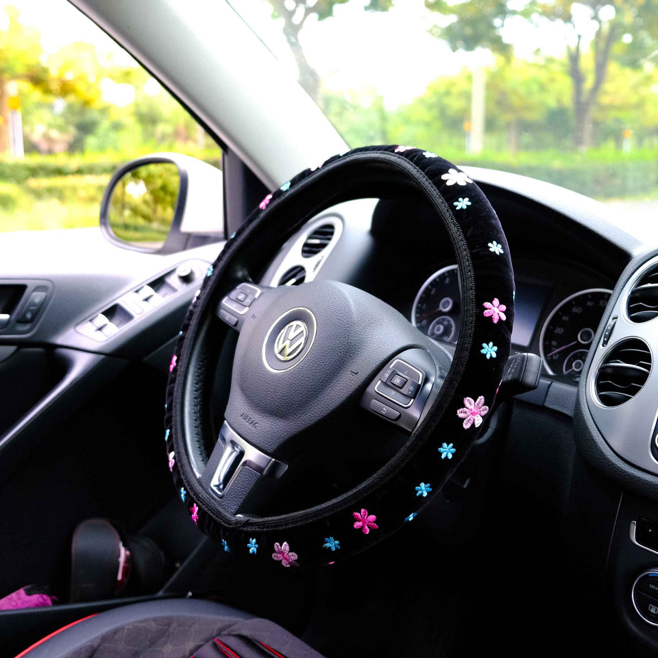 Pink embroidered steering wheel cover with matching belt cover option