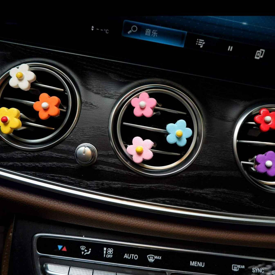 Small daisy flower car vent clip air freshener set in warm and cool tones
