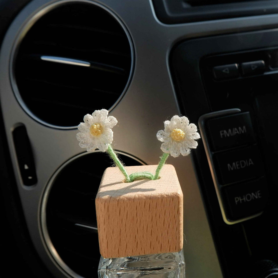 Refillable car diffuser bottle with tiny crochet flower details