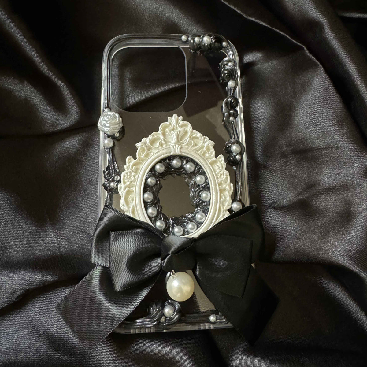 Elegant bow phone case with rose and pearl-style decoration