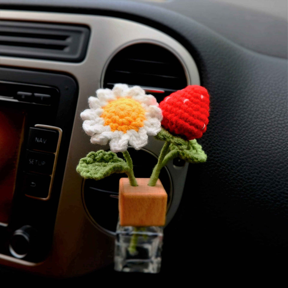 Crochet plant-style car diffuser bottle with strawberry and daisy details