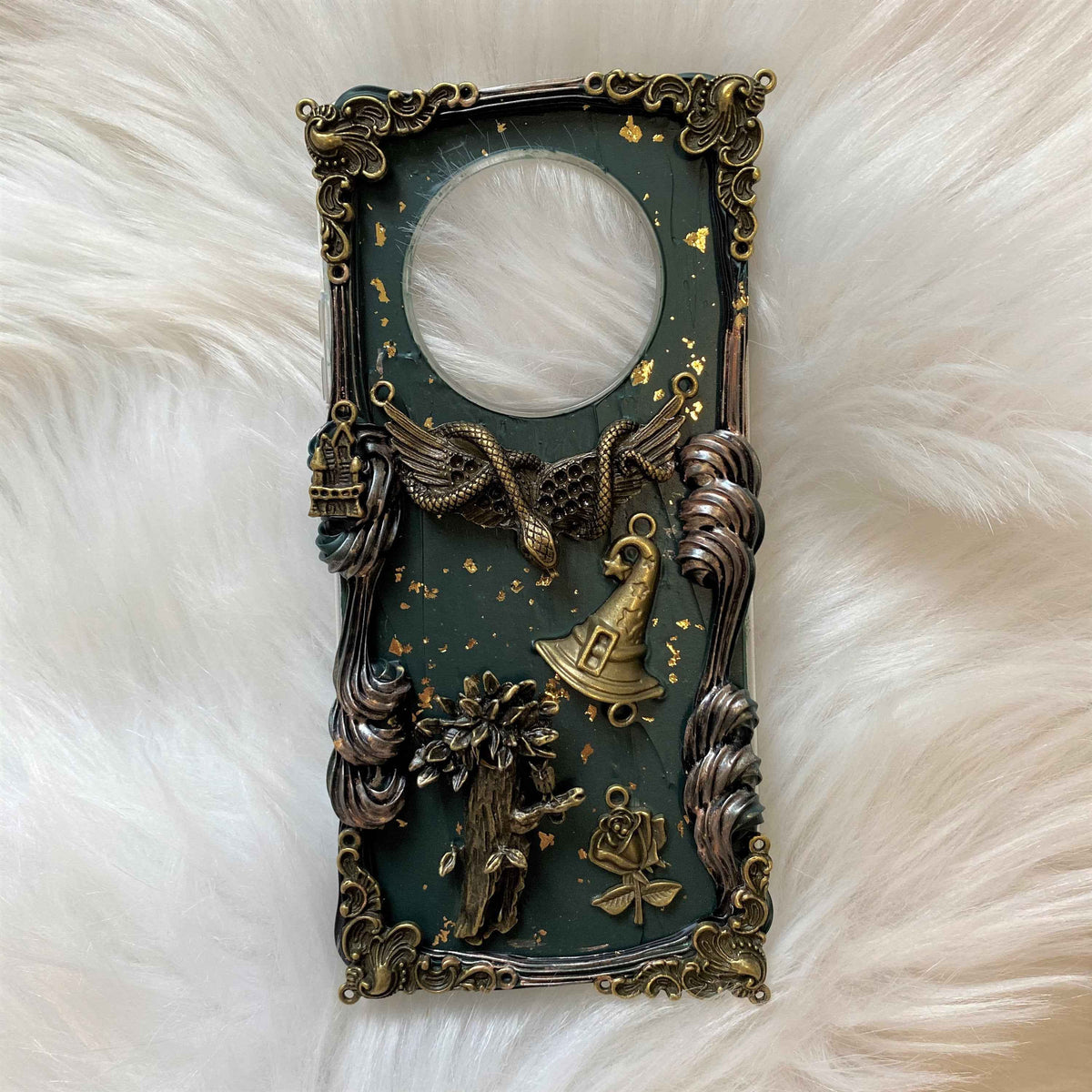 Handmade wizard-style phone case with 3D cream and charm details